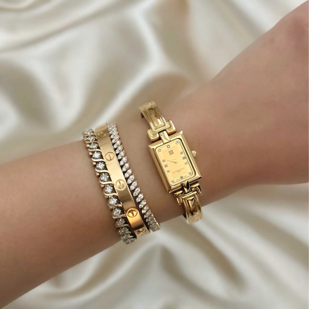 AUTHENTIC RARE VINTAGE GIVENCHY GOLD WATCH - WITH DIAMOND HOUR MARKERS